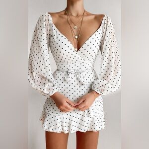 SHOWPO YOU ARE SUCH A DREAM DRESS IN WHITE FLOCKED SPOT